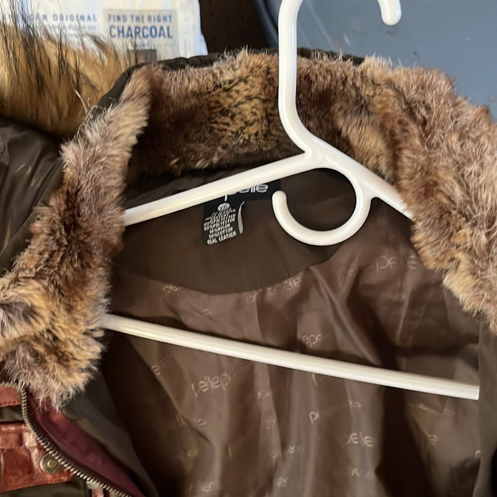 Olive green, Pelle Pelle down jacket with hoodie somewhere in tear,